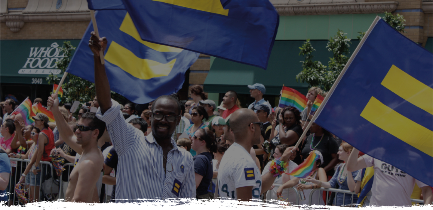 People waving HRC flags