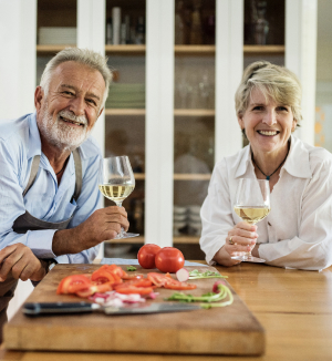 A couple drinking wine at the dinner table