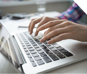 Person typing on a laptop